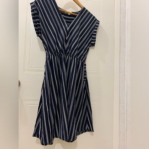 Monteau navy blue dress with pockets.